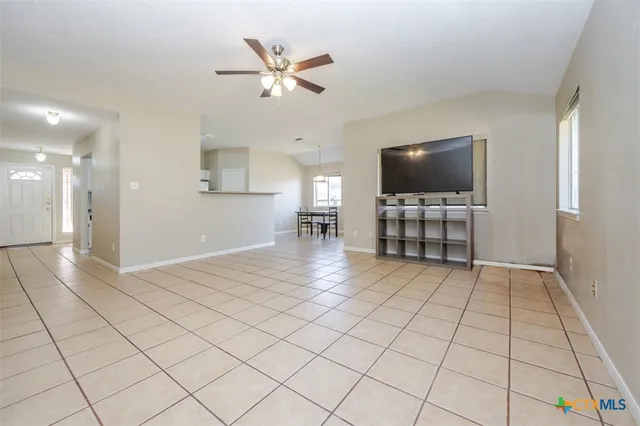 a view of livingroom with furniture and flat screen tv
