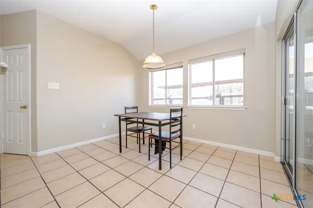 a dining room well furnished