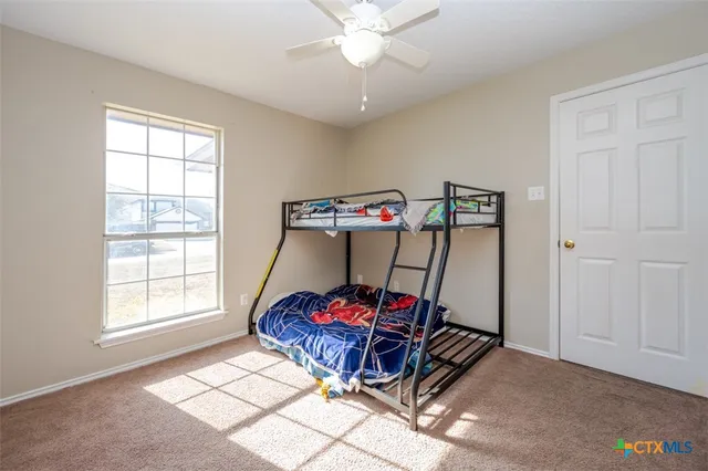 a view of a room with window gym equipment