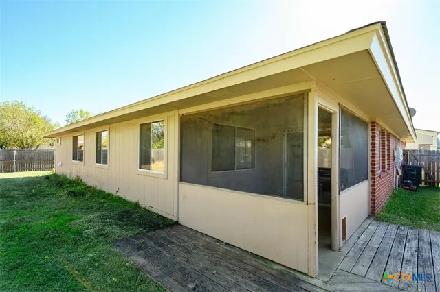 a front view of a house with yard