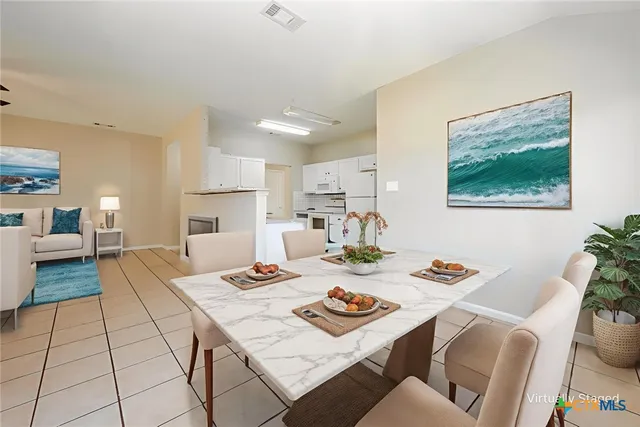 a view of a dining room and livingroom