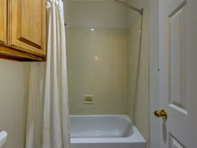 a bathroom with a bathtub