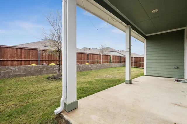 a view of a backyard with a garden
