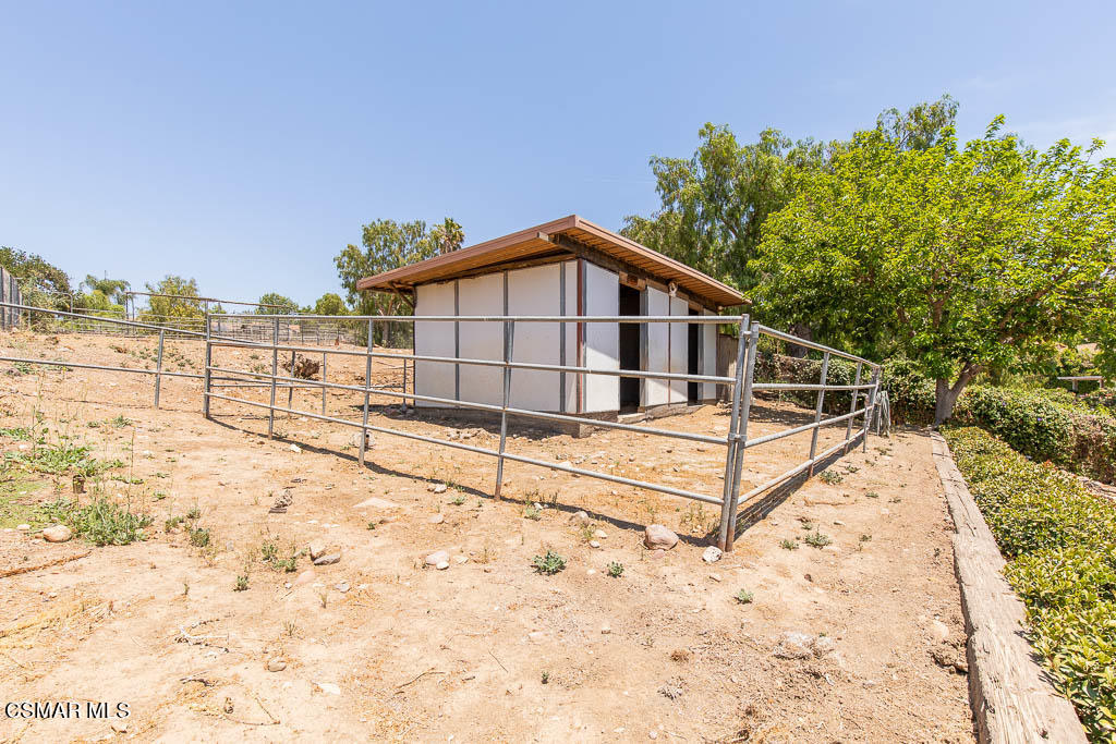 1161 Rambling Road Simi Valley, CA 93065 - Photo 33 of 48 a view of a house with a yard