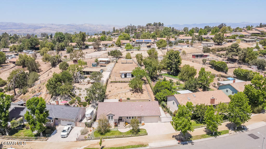 1161 Rambling Road Simi Valley, CA 93065 - Photo 40 of 48 an aerial view of residential houses with outdoor space and trees