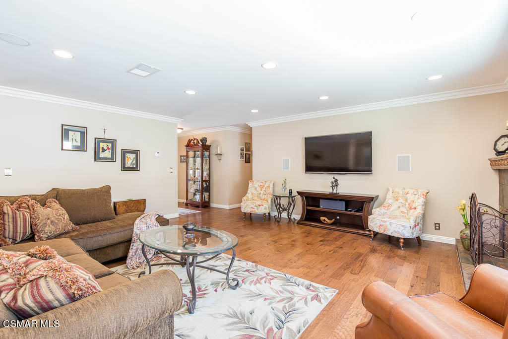 1161 Rambling Road Simi Valley, CA 93065 - Photo 6 of 48 a living room with furniture and a flat screen tv
