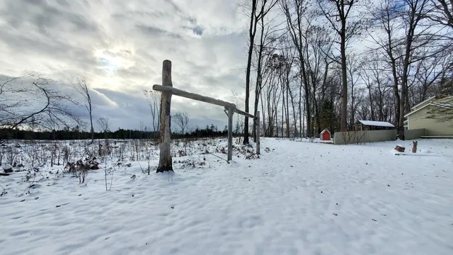 $279,900 | 128 Wooden Key Drive, Houghton Lake, MI 48629