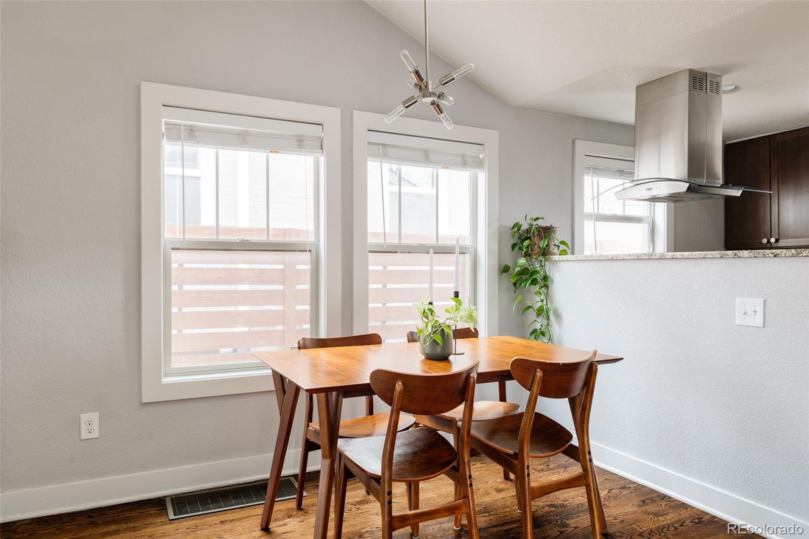 3100 North High Street Denver, CO 80205 - Photo 7 of 28 a dining room with furniture and window