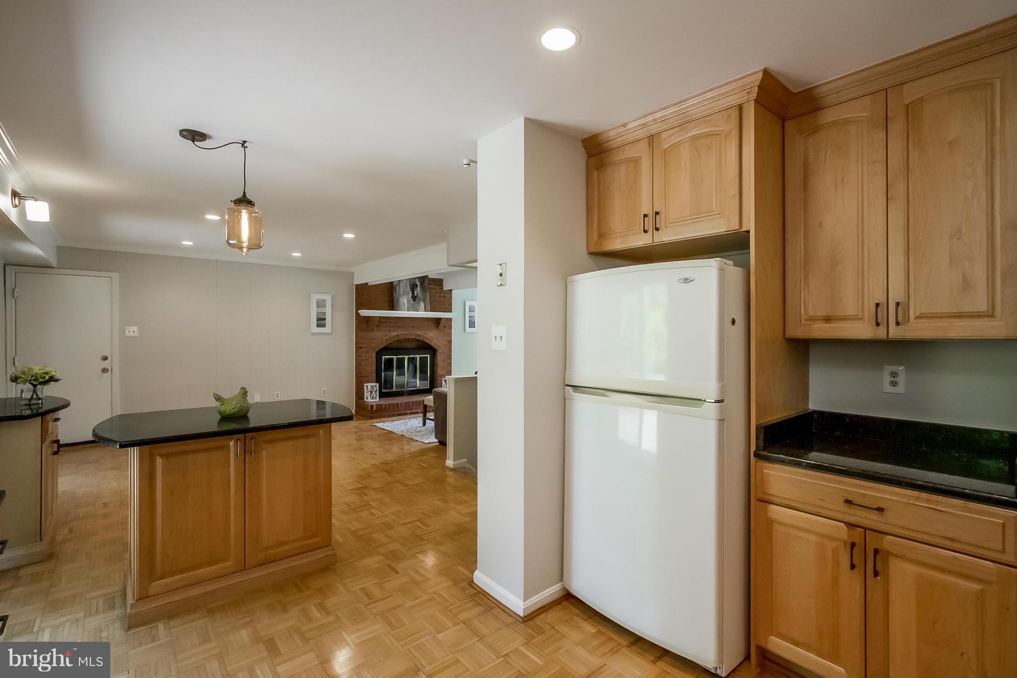 3 Rudis Way Gaithersburg, MD 20878 - Photo 8 of 30 a kitchen with stainless steel appliances granite countertop a refrigerator a stove and a sink with cabinets