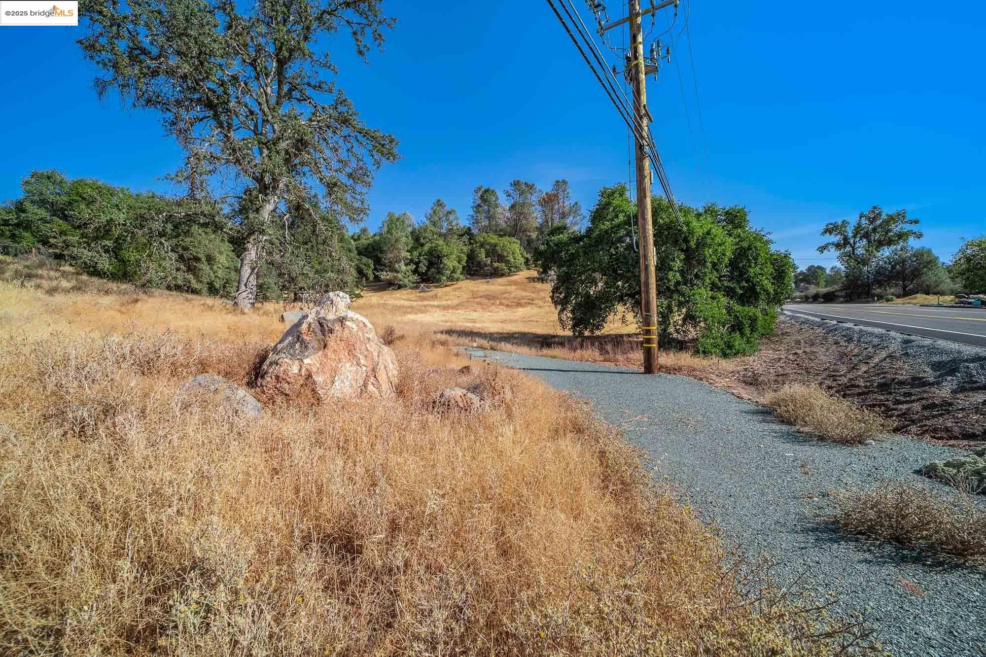 0 Sturgis Road Sonora, CA 95370 - Photo 14 of 18 a view of a yard with wooden fence