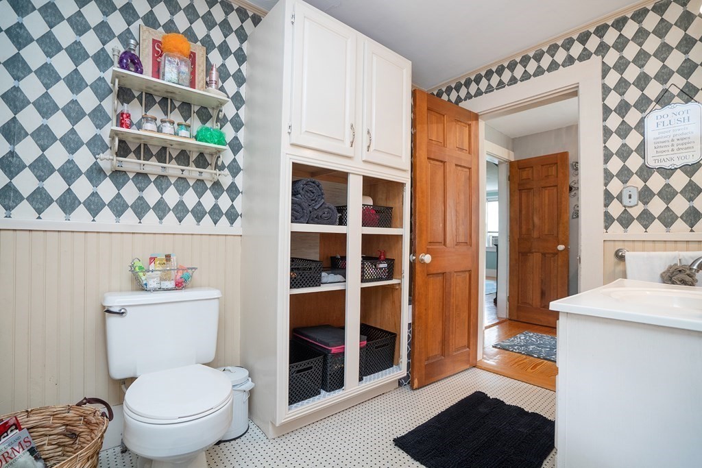 215 Market Street Amesbury, MA 01913 - Photo 27 of 41 a bathroom with a toilet a sink and a shower