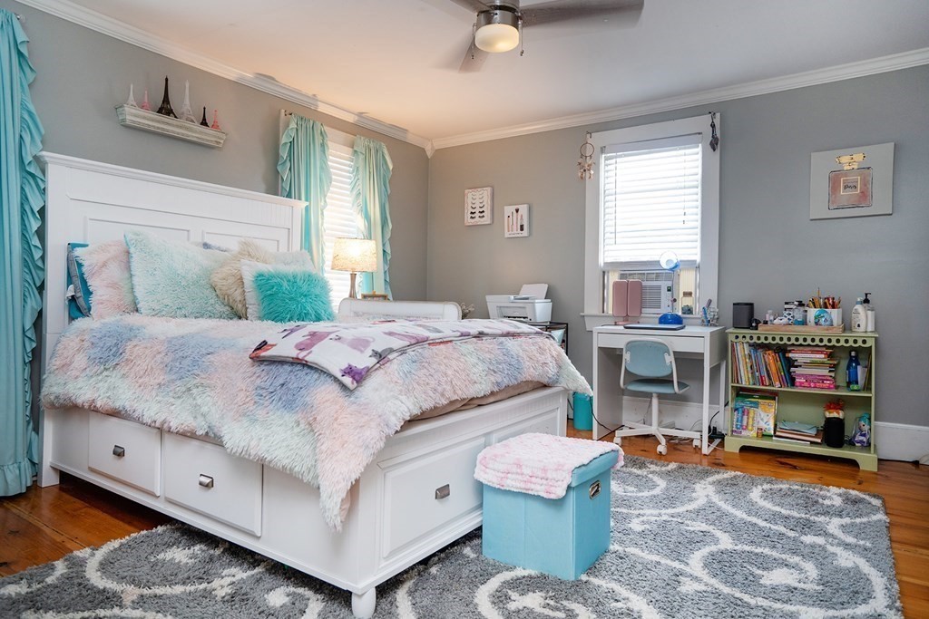 215 Market Street Amesbury, MA 01913 - Photo 28 of 41 a bedroom with a bed and window