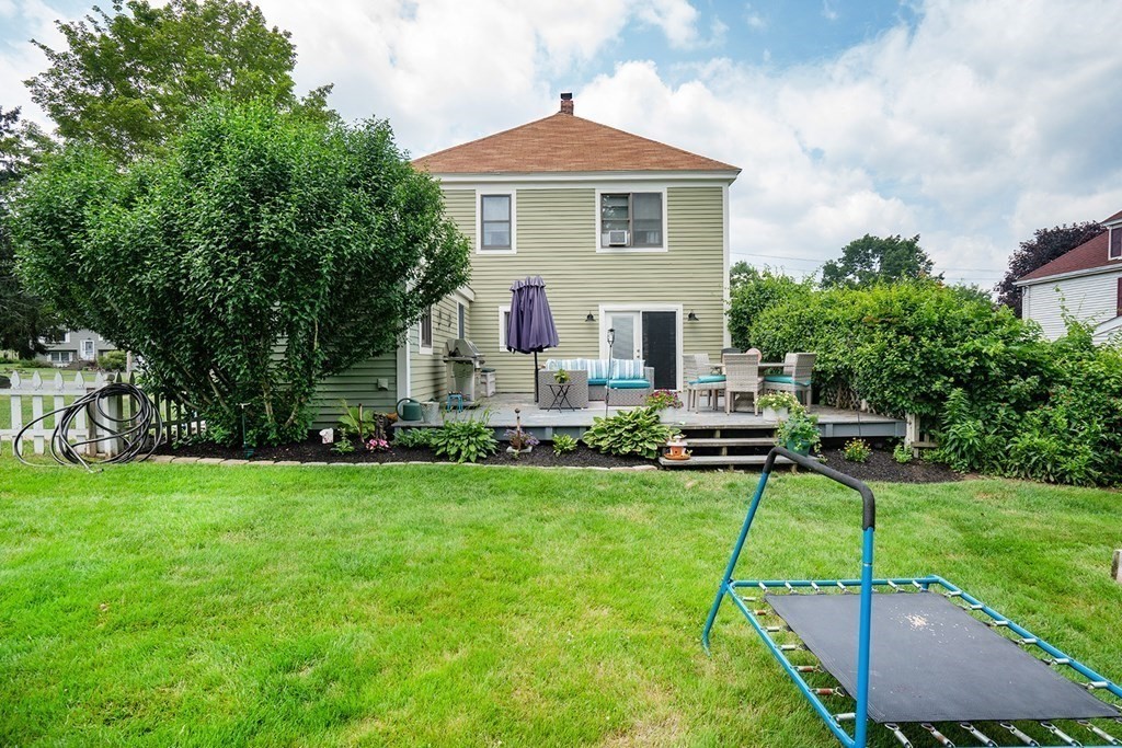 215 Market Street Amesbury, MA 01913 - Photo 34 of 41 a view of a house with a yard porch and sitting area