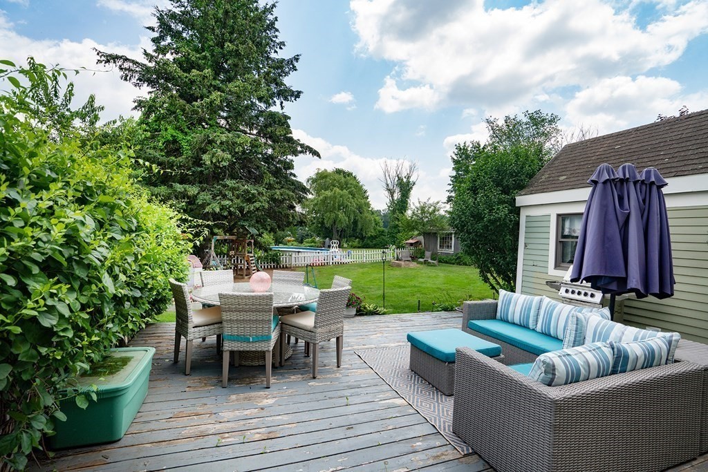 215 Market Street Amesbury, MA 01913 - Photo 39 of 41 a view of a house with couches chairs and a yard