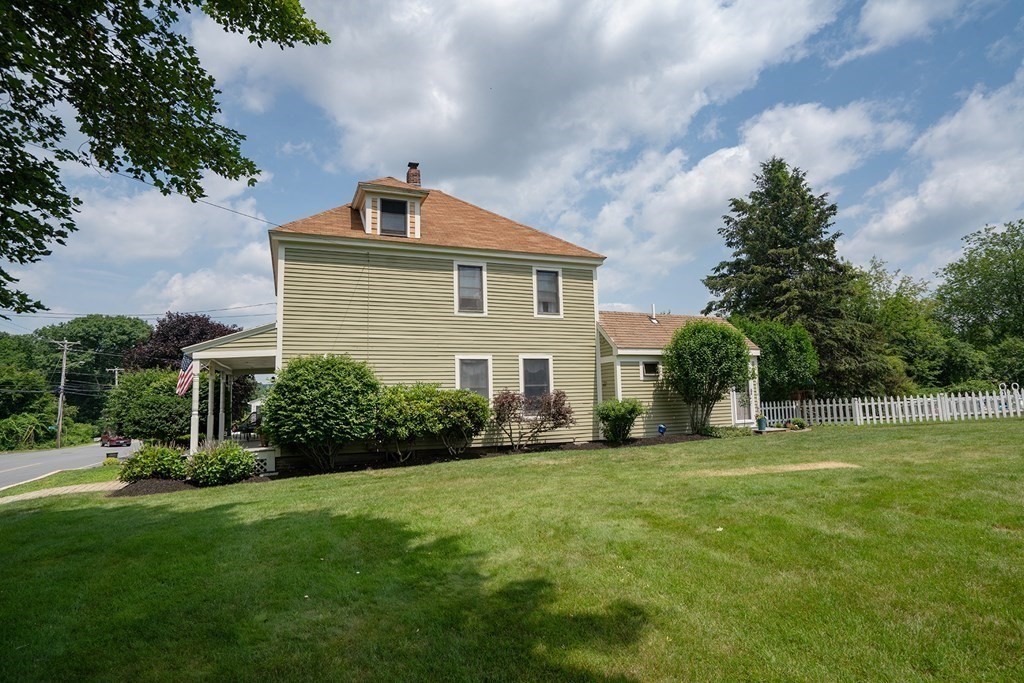 215 Market Street Amesbury, MA 01913 - Photo 41 of 41 a front view of house with yard and green space