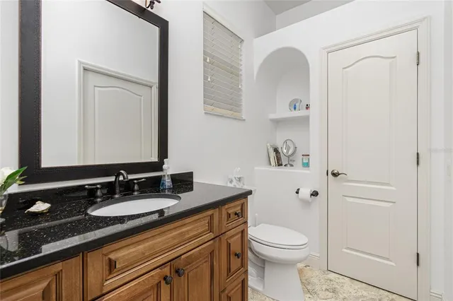 a view of a swimming pool with a porch