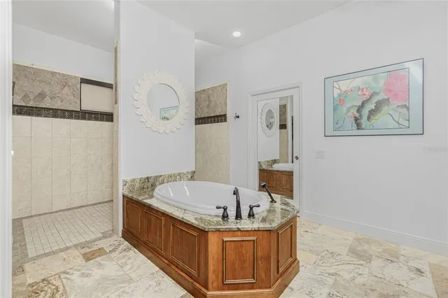 a outdoor space with couch and chairs