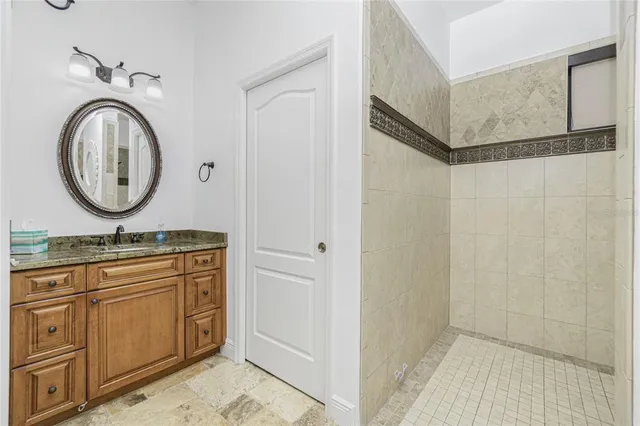 a view of a house with swimming pool and a yard