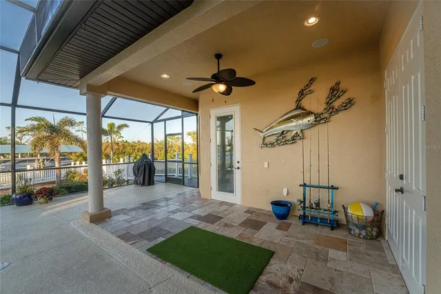 a view of a lake with houses in the back