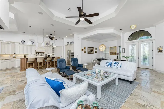 a kitchen with stainless steel appliances granite countertop a sink and cabinets