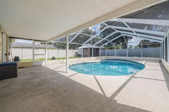 a view of a backyard of a house