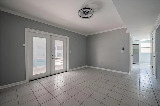 a view of an empty room and window