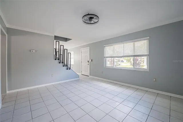 an empty room with windows