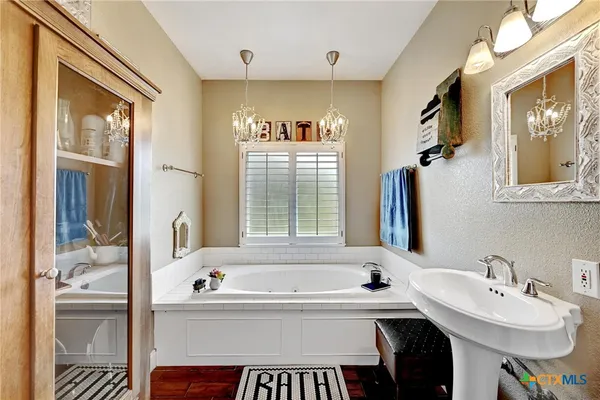 a bathroom with a sink and a bathtub