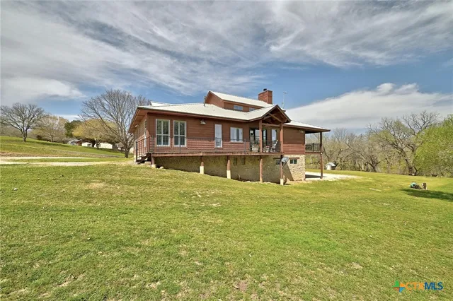 a view of a park with large trees