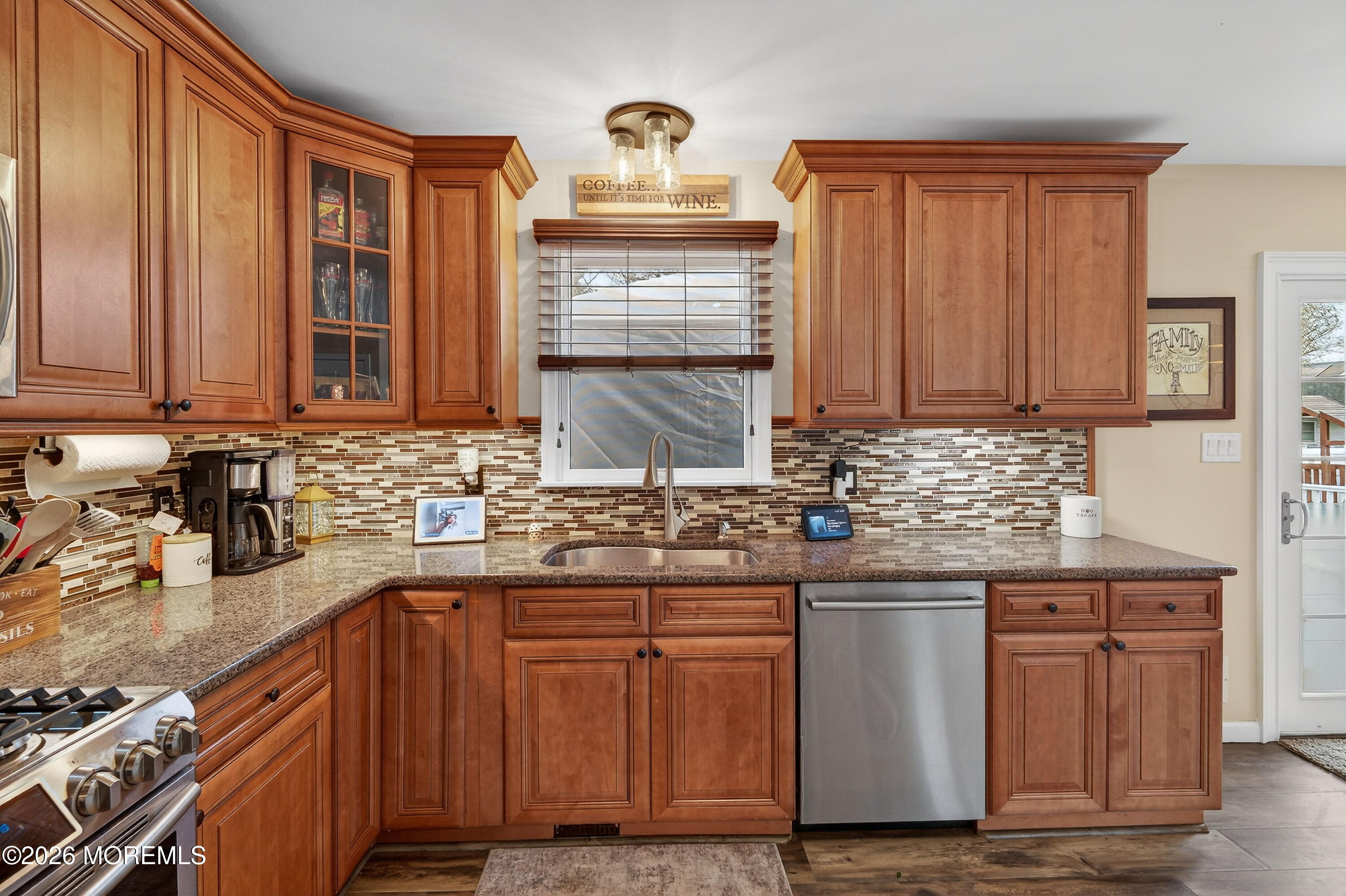 1660 Joffre Road Forked River, NJ 08731 - Photo 13 of 35 a kitchen with stainless steel appliances granite countertop a sink stove and cabinets