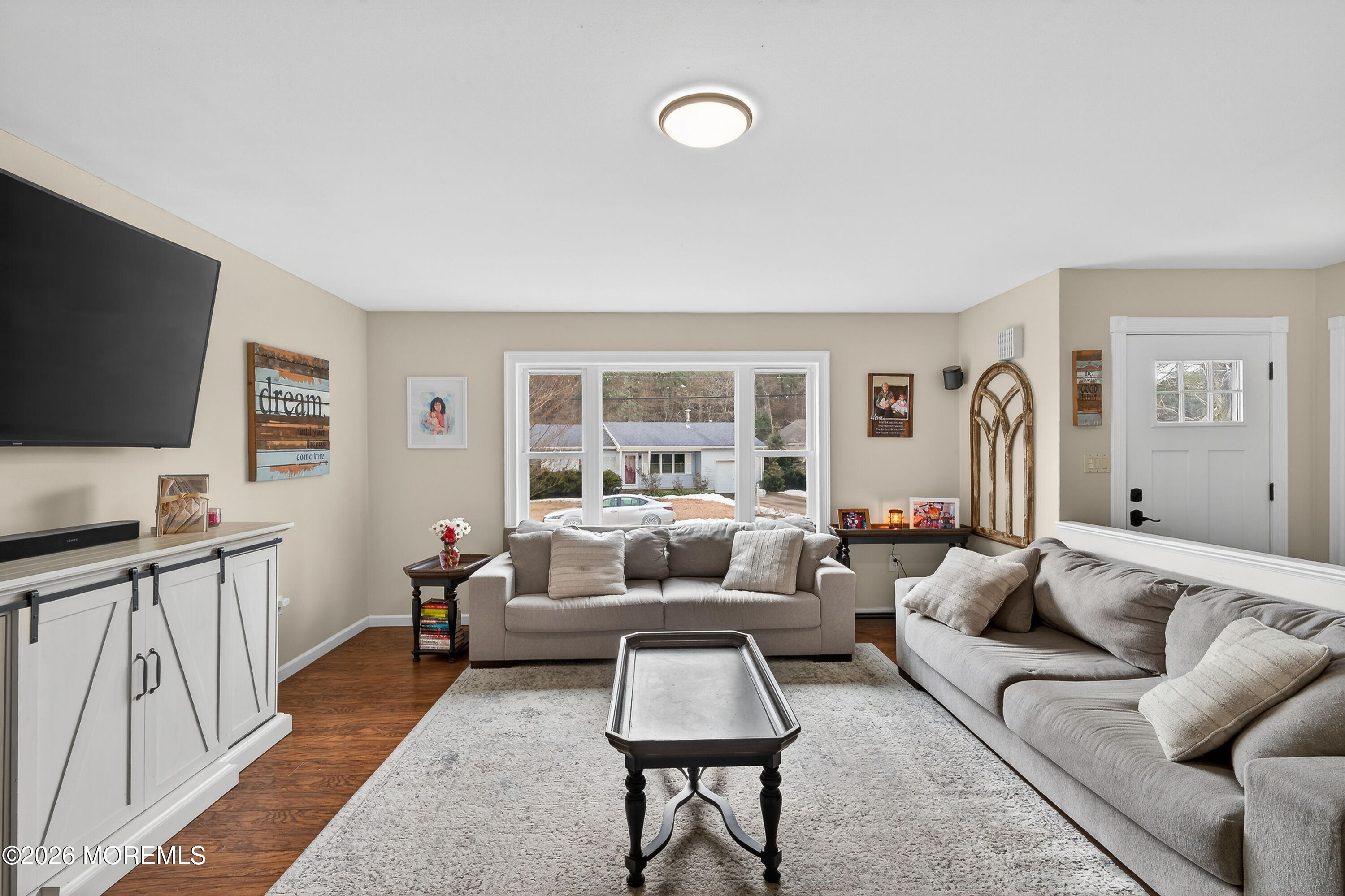 1660 Joffre Road Forked River, NJ 08731 - Photo 19 of 35 a living room with furniture and a flat screen tv