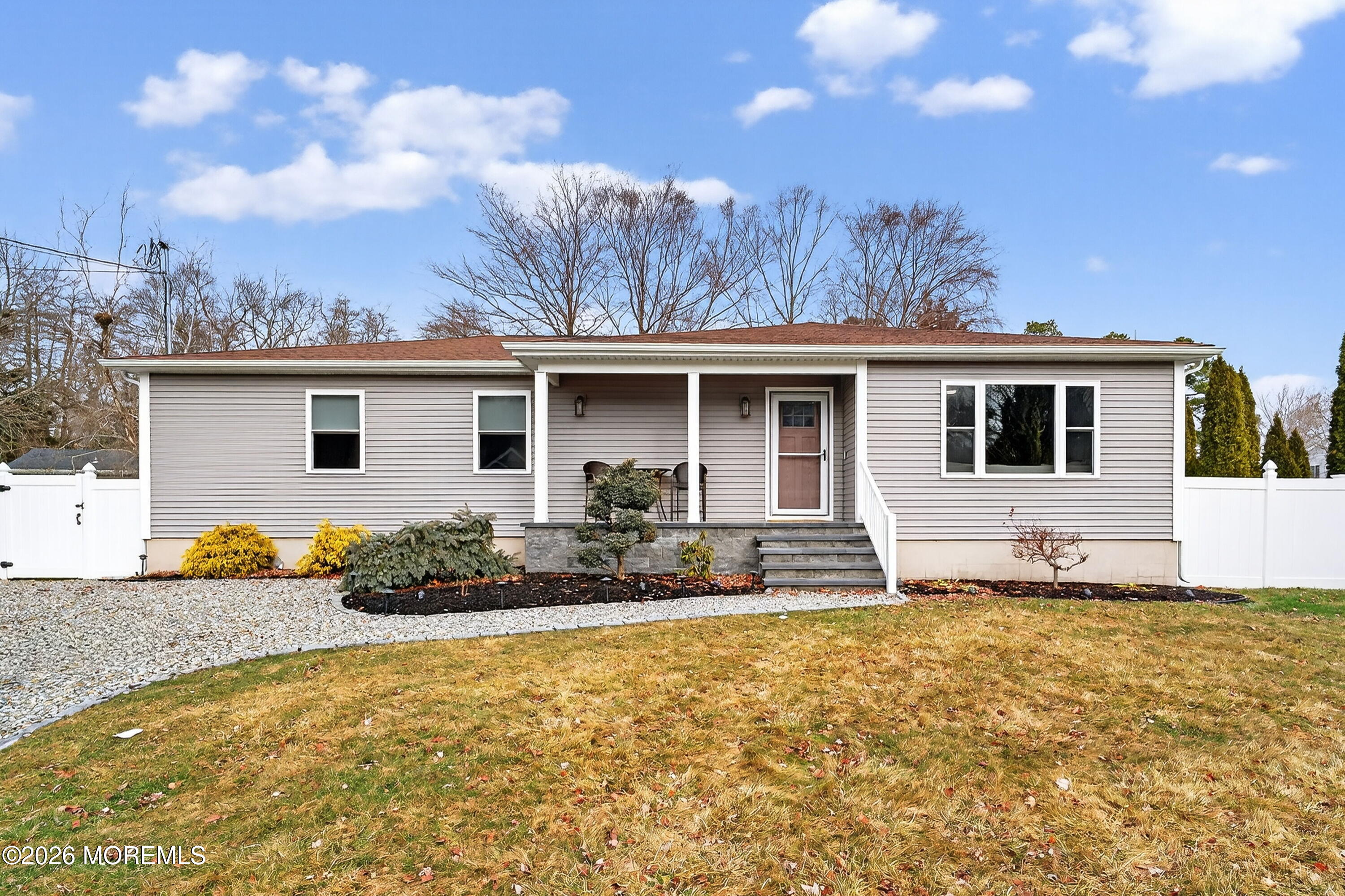 1660 Joffre Road Forked River, NJ 08731 - Photo 2 of 35 a front view of a house with a garden