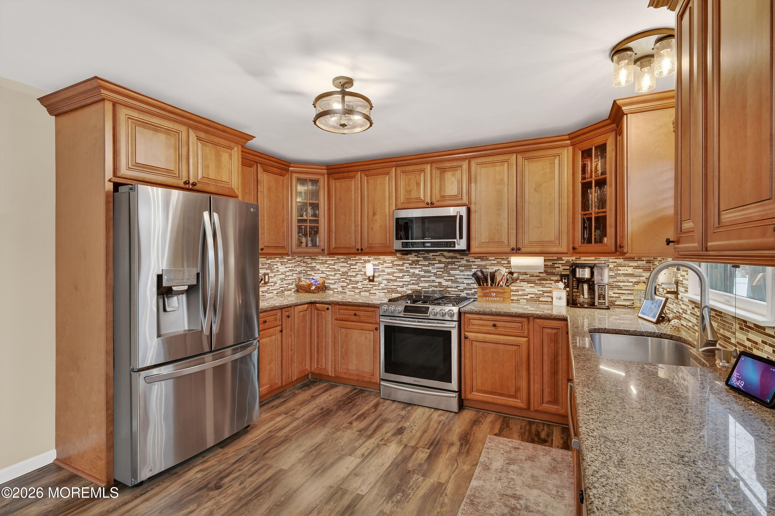 1660 Joffre Road Forked River, NJ 08731 - Photo 22 of 35 a kitchen with stainless steel appliances granite countertop a refrigerator stove microwave and sink