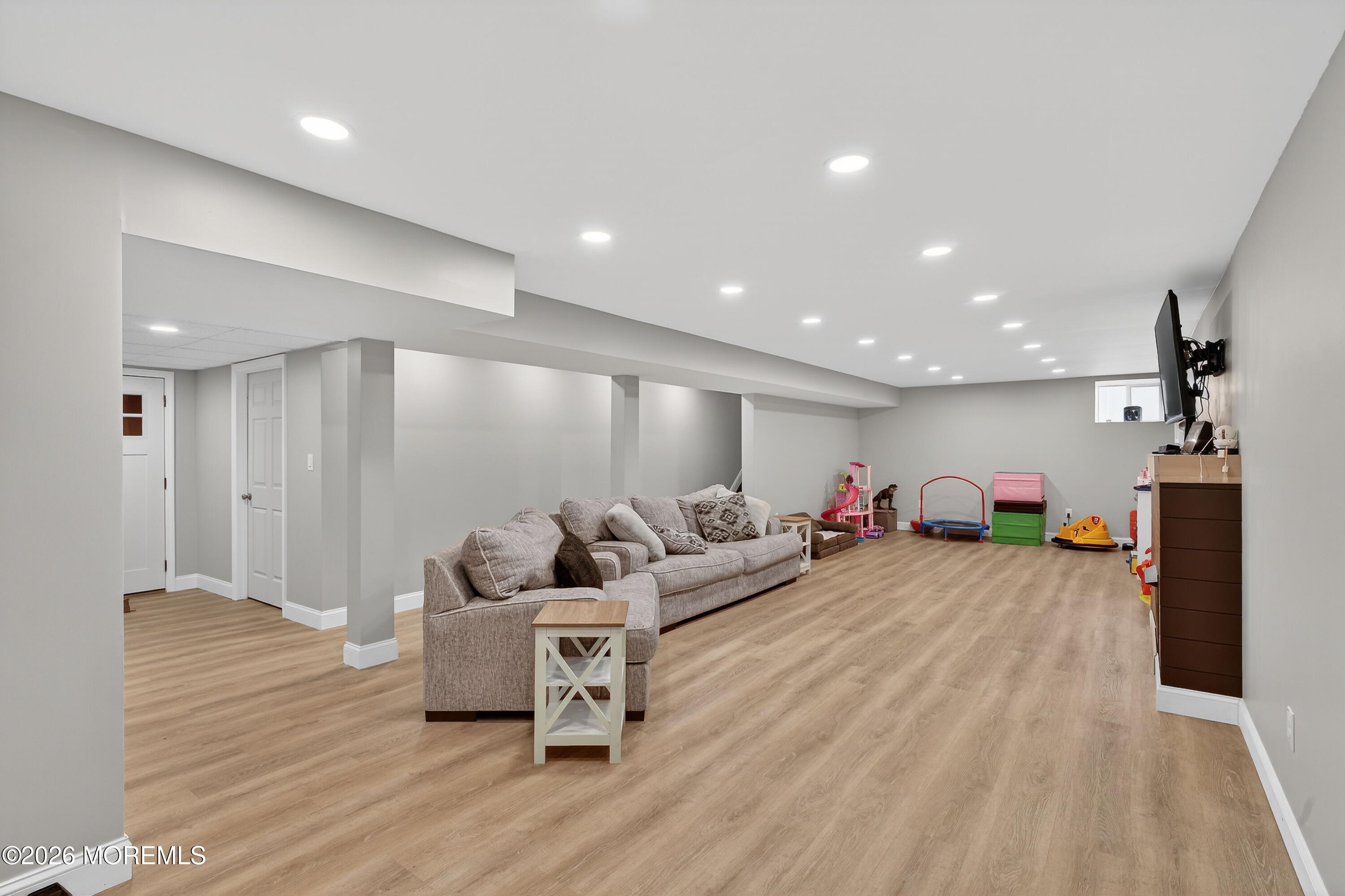 1660 Joffre Road Forked River, NJ 08731 - Photo 27 of 35 a living room with furniture and a wooden floor