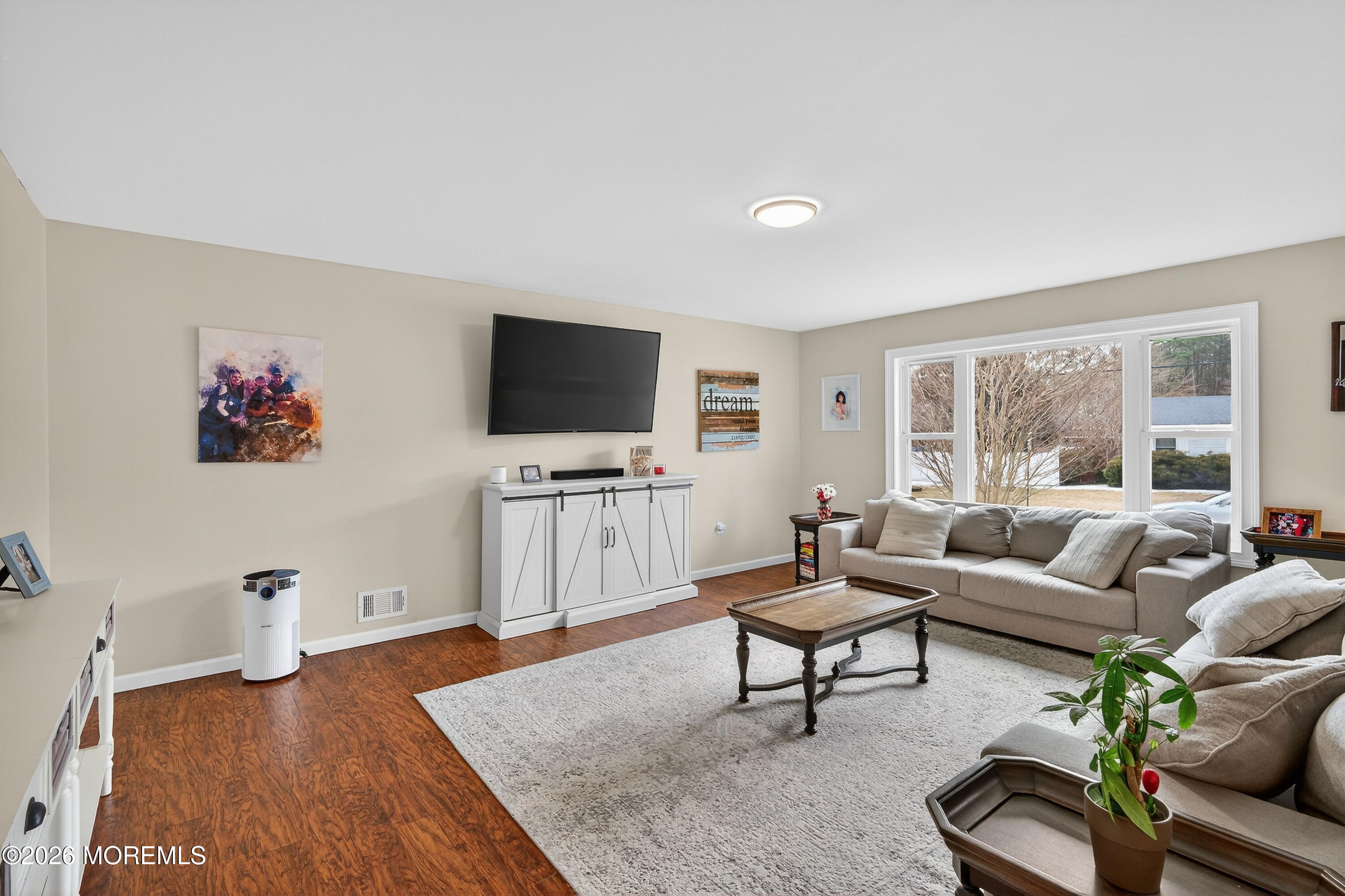 1660 Joffre Road Forked River, NJ 08731 - Photo 3 of 35 a living room with furniture and a flat screen tv