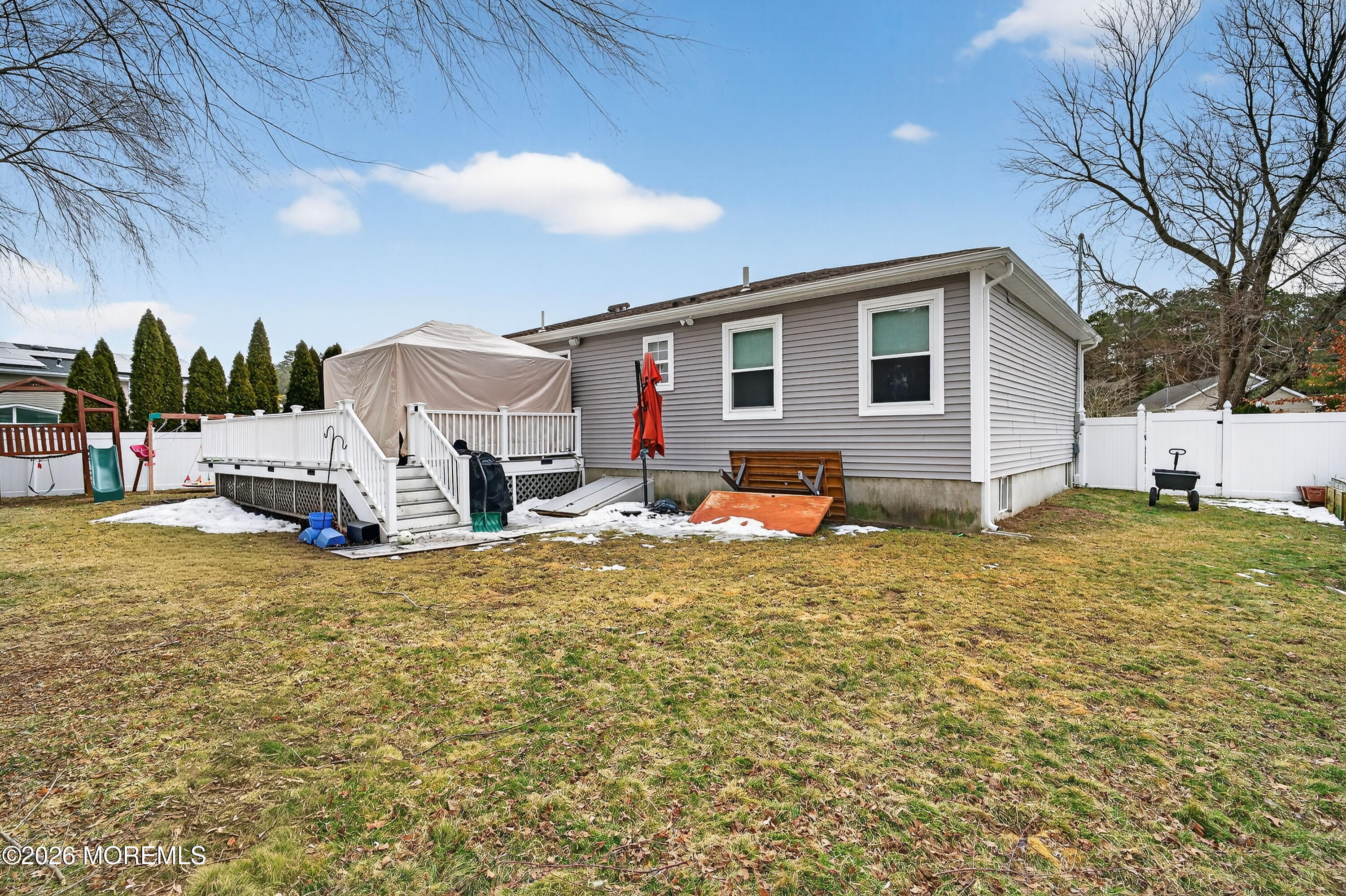 1660 Joffre Road Forked River, NJ 08731 - Photo 32 of 35 a view of a house with a yard
