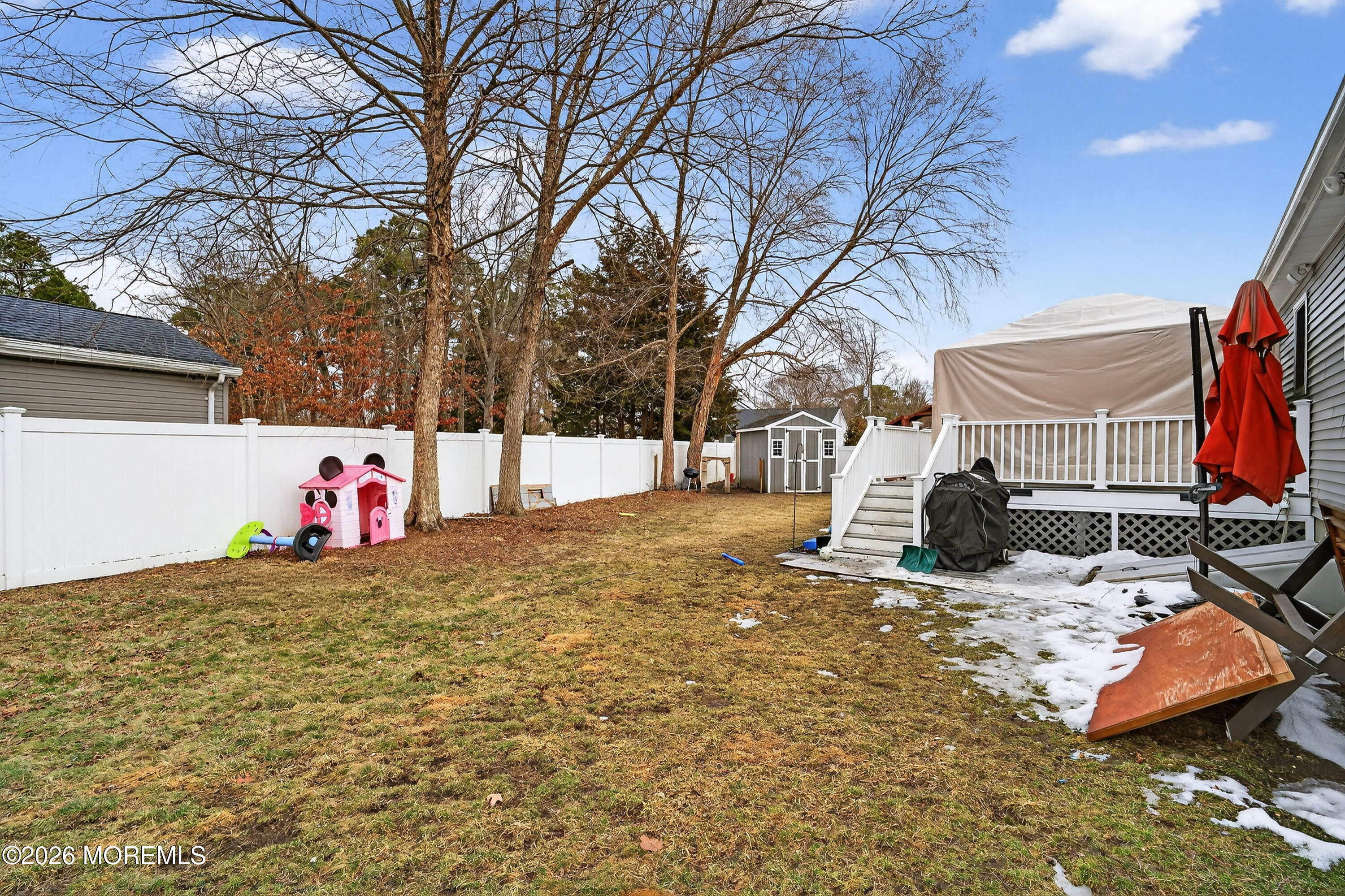 1660 Joffre Road Forked River, NJ 08731 - Photo 33 of 35 a view of a white house with a snow on the road