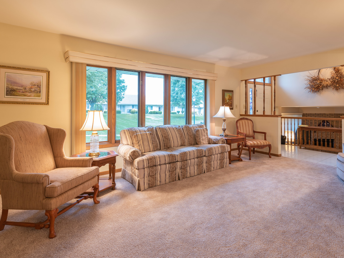 17841 Maine Court Orland Park, IL 60467 - Photo 2 of 29 a living room with furniture and a large window