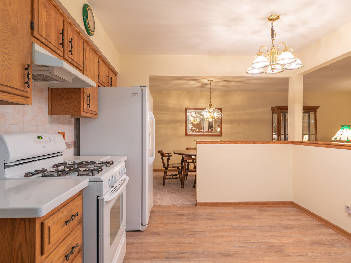 17841 Maine Court Orland Park, IL 60467 - Photo 14 of 29 a kitchen with stainless steel appliances granite countertop a stove and a refrigerator