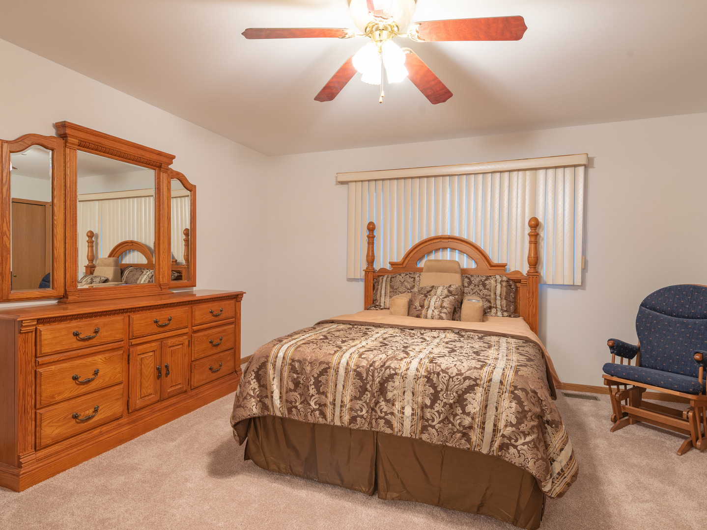 17841 Maine Court Orland Park, IL 60467 - Photo 22 of 29 a bedroom with a bed and a dresser