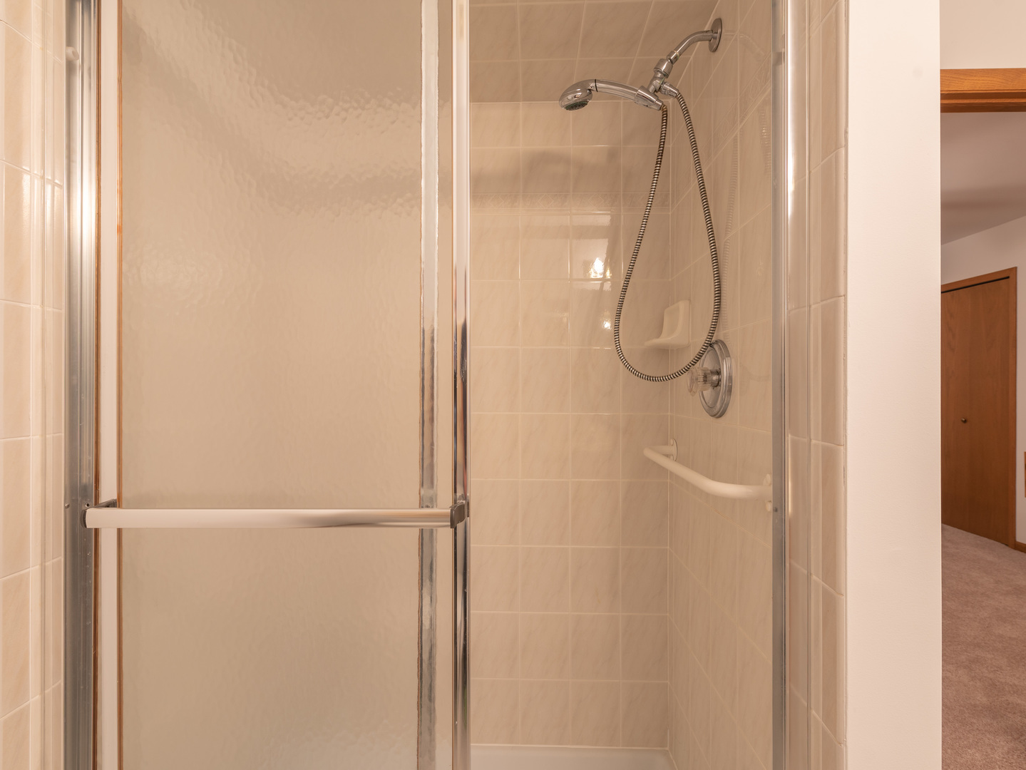 17841 Maine Court Orland Park, IL 60467 - Photo 27 of 29 a bathroom with a glass shower door