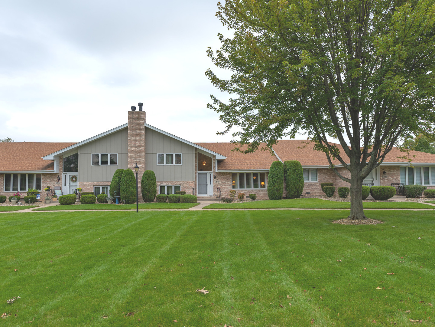 17841 Maine Court Orland Park, IL 60467 - Photo 6 of 29 a front view of building with yard and green space