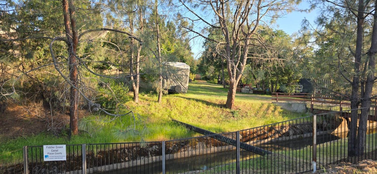0 2059 Bell Road Auburn, CA 95603 - Photo 11 of 40 a view of a swimming pool with a patio and backyard