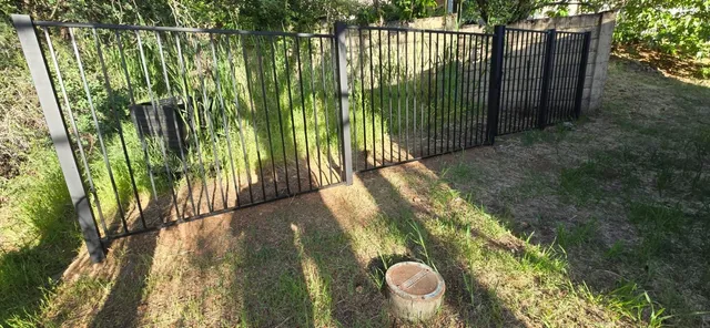 a view of a trees with a yard