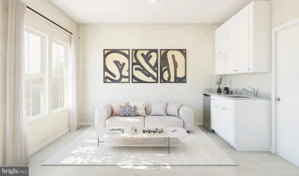 a living room with furniture and white walls