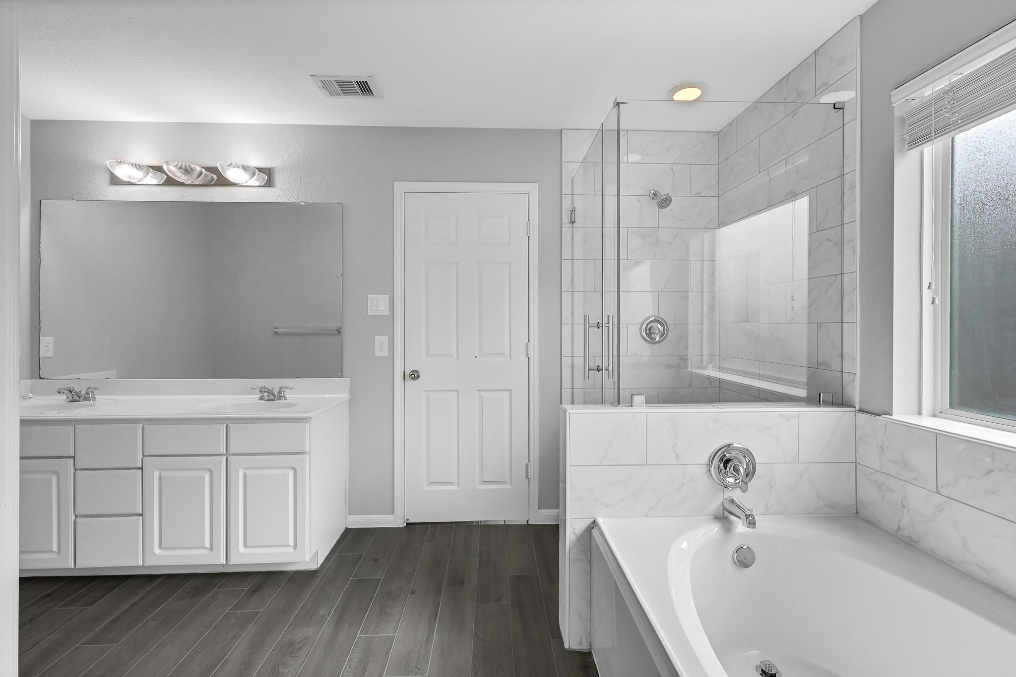 20039 Sunshine Ridge Lane Cypress, TX 77429 - Photo 19 of 22 Separate shower and bathtub in the primary bathroom