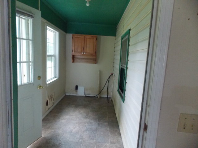 454 Cochran, GA 31014 - Photo 7 of 8 a view of an empty room with a window
