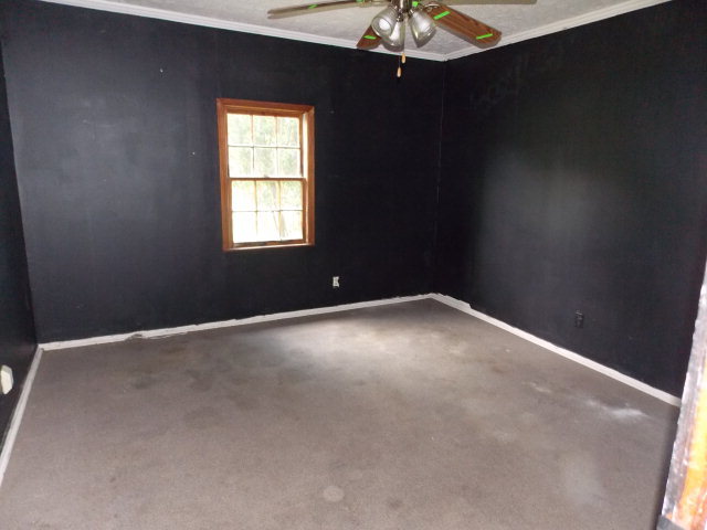 454 Cochran, GA 31014 - Photo 8 of 8 a view of an empty room with a window