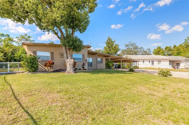 a view of a house with a patio