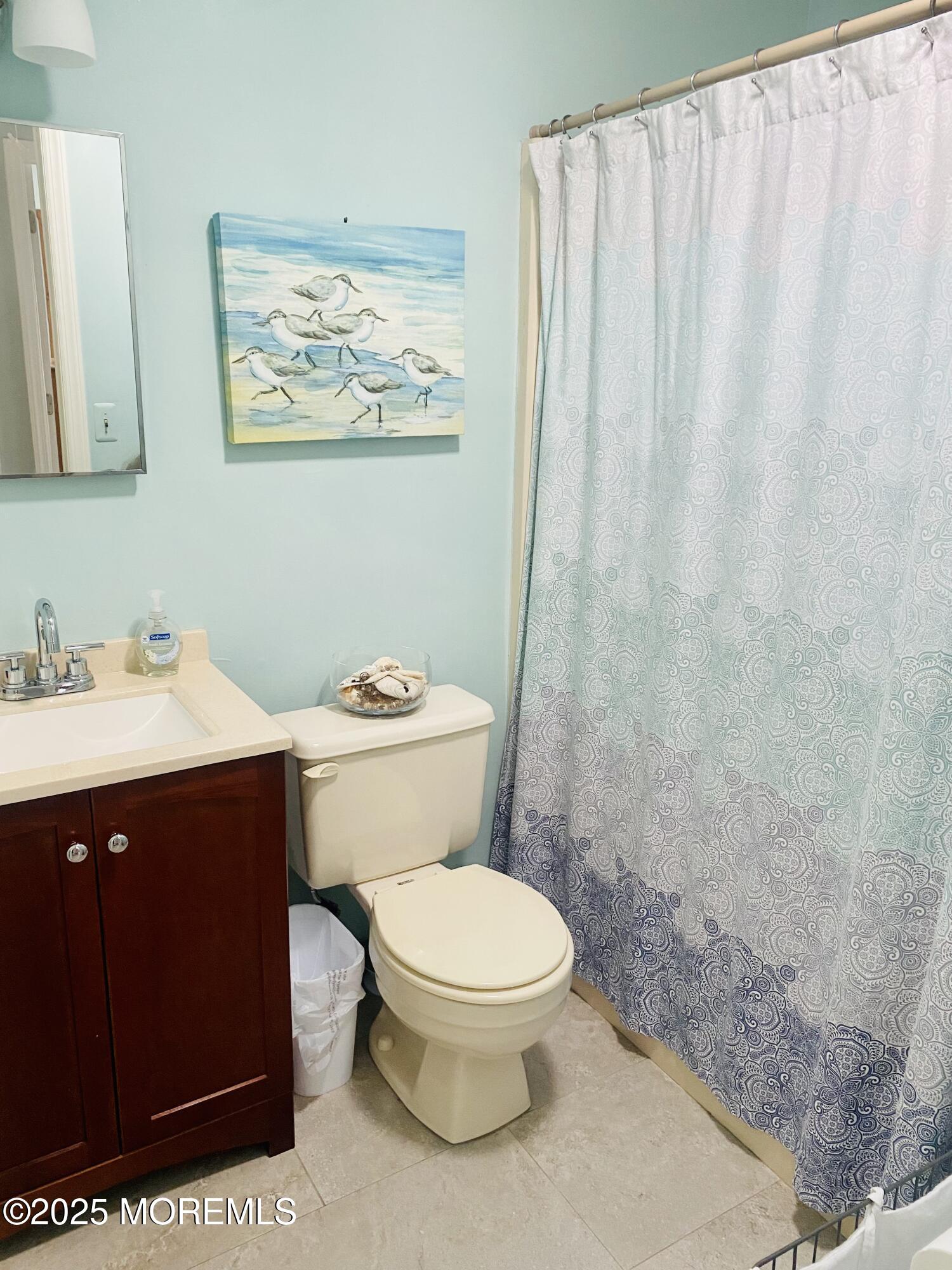 104 5th Avenue, Unit UP Seaside Heights, NJ 08751 - Photo 14 of 17 a bathroom with a sink and a toilet